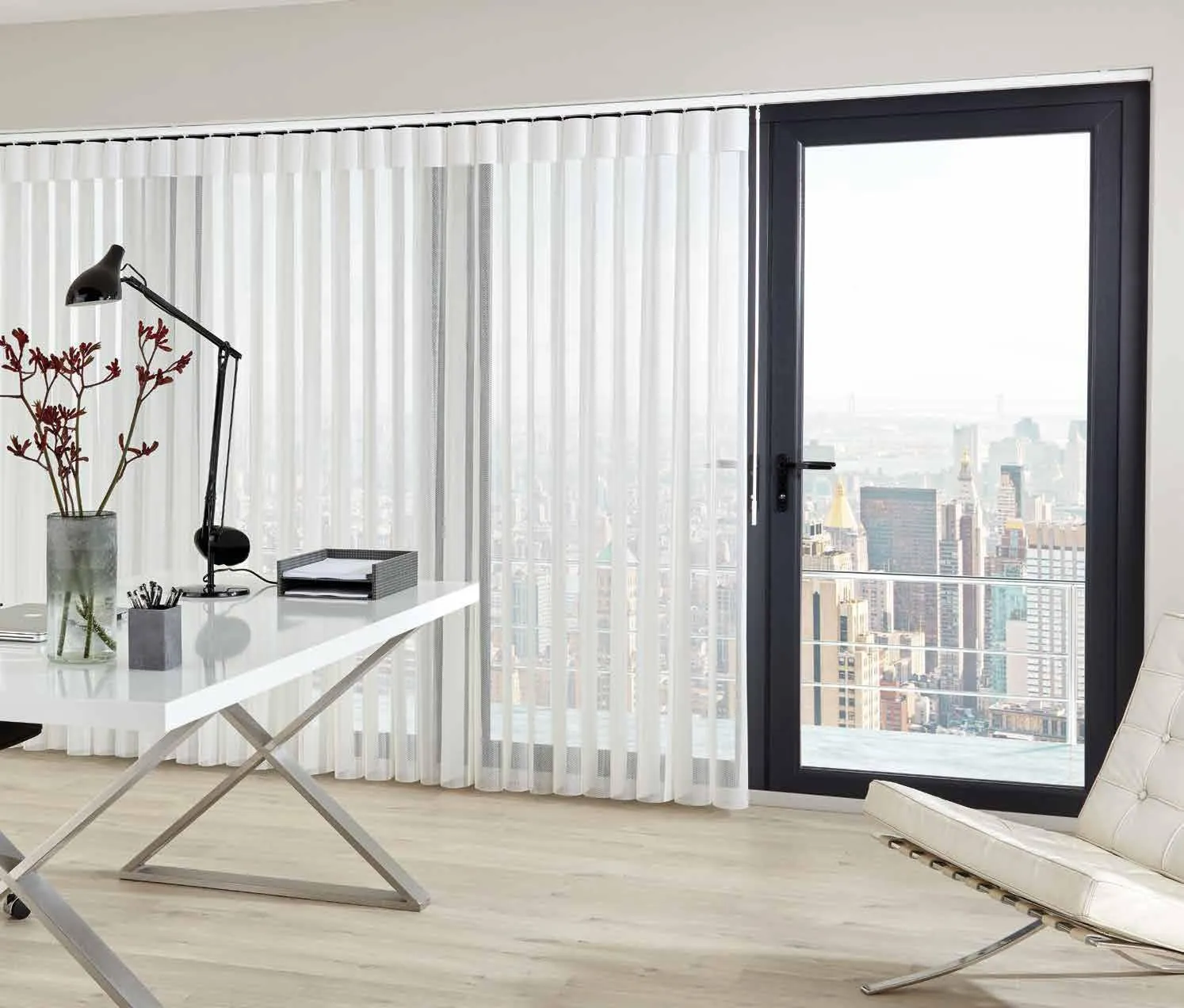 What’s the Difference Between Vertical Blinds and Roller Blinds for Large Windows?
